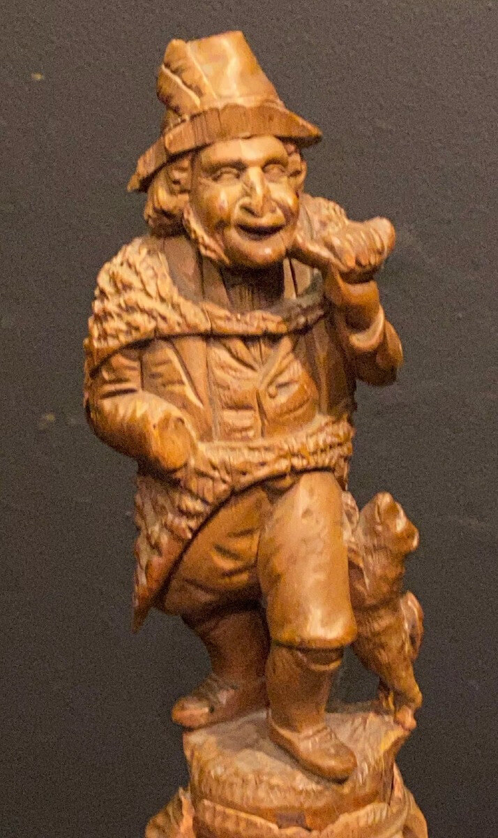 statuette, homme à la trompe