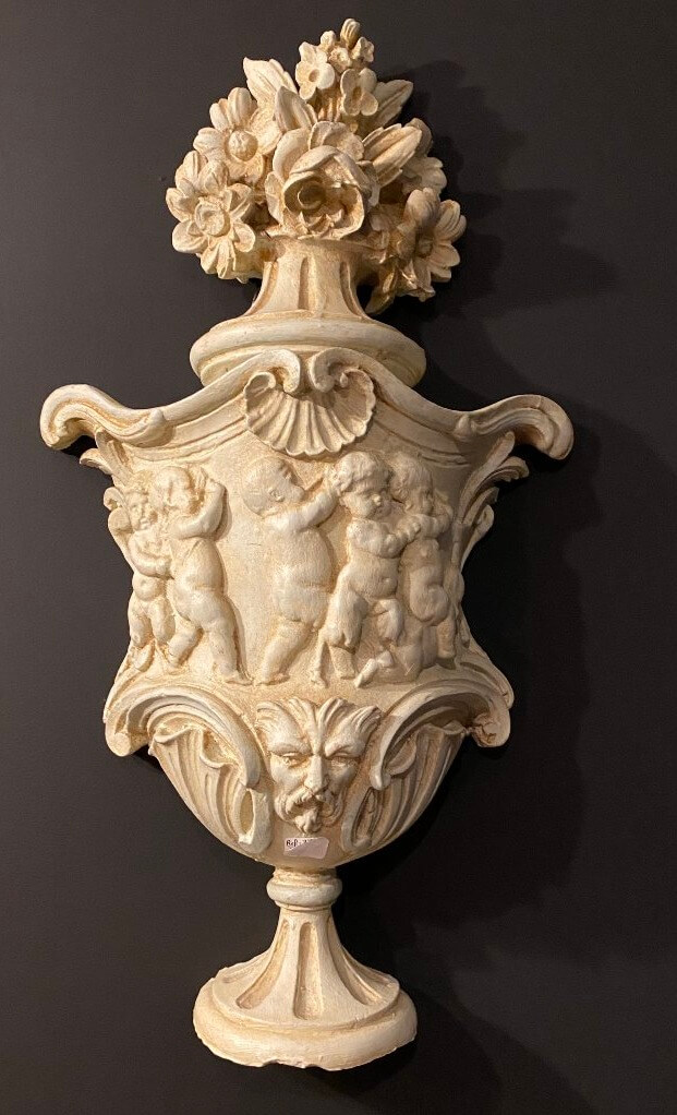 pot fleuri en plâtre
